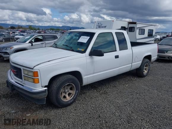 1995 GMC Sierra 1500 z VIN 2GTEC19K7S1593550, wystawiony jako IAAI lot #41929126 z przebiegiem 255 453 mil mil oraz . Historia ofert i sprzedaży dostępna na DreamBid. Obrazek 2.
