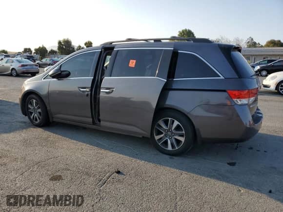 2015 Honda Odyssey Touring Elite с VIN 5FNRL5H94FB078340, выставлен на аукционе Copart как лот 80651515 с пробегом 171 249 миль миль и Списание • Salvage title. История ставок и продаж доступна на DreamBid. Изображение 2.