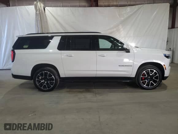 2025 Chevrolet Suburban RST с VIN 1GNS6ERLXSR271347, выставлен на аукционе Copart как лот 86137015 с пробегом 678 миль миль и Списание • Salvage title. История ставок и продаж доступна на DreamBid. Изображение 13.