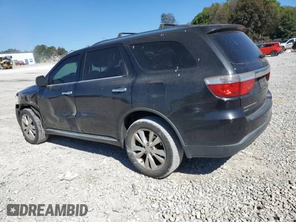 2013 Dodge Durango Crew with VIN 1C4RDJDG6DC695419, listed as a Copart auction lot 87022395 with 219,976 mi miles and Salvage title. Bid and sale history available at DreamBid. Image 2.