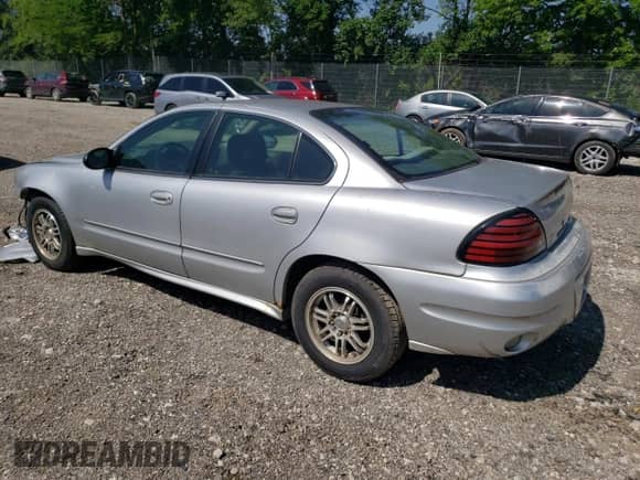 2003 Pontiac Grand Am SE with VIN 1G2NE52F73C302849, listed as a Copart auction lot 61597295 with 94,732 mi miles and Clean title. Bid and sale history available at DreamBid. Image 2.