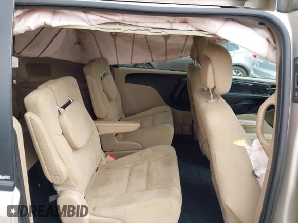 2014 Dodge Grand Caravan SE with VIN 2C4RDGBG8ER309405, listed as a IAAI auction lot 43276389 with 242,036 mi miles and . Bid and sale history available at DreamBid. Image 8.