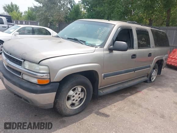 2002 Chevrolet Suburban Z71 with VIN 3GNFK16Z12G288908, listed as a IAAI auction lot 42889403 with 202,639 mi miles and . Bid and sale history available at DreamBid. Image 2.