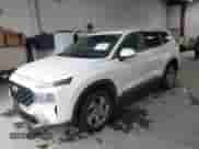 2021 Hyundai Santa Fe SE with VIN 5NMS1DAJ2MH352913, listed as a IAAI auction lot 43548098 with 93,758 mi miles and . Bid and sale history available at DreamBid. Image 2.