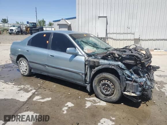 1994 Honda Accord LX z VIN 1HGCD5638RA083668, wystawiony jako Copart lot #58794355 z przebiegiem 180 532 mil mil oraz Szkoda całkowita • Salvage title. Historia ofert i sprzedaży dostępna na DreamBid. Obrazek 4.