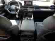 2023 Honda Pilot Elite with VIN 5FNYG1H82PB034130, listed as a Copart auction lot 56763214 with 7,710 mi miles and Salvage title. Bid and sale history available at DreamBid. Image 8.