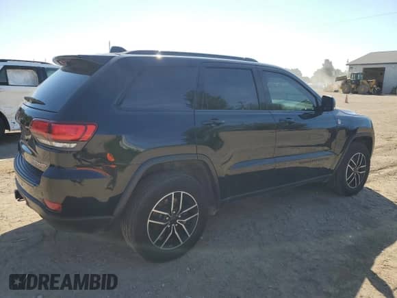 2020 Jeep Grand Cherokee Trailhawk с VIN 1C4RJFLT6LC185588, выставлен на аукционе Copart как лот 70190395 с пробегом 99 932 миль миль и Чистый • Clean title. История ставок и продаж доступна на DreamBid. Изображение 3.