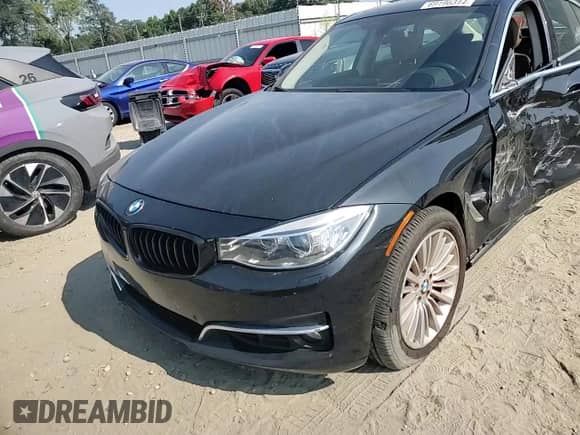 2014 BMW 3 Series 335i Gran Turismo xDrive z VIN WBA3X9C51ED153195, wystawiony jako Copart lot #69196314 z przebiegiem 155 539 mil mil oraz Szkoda całkowita • Salvage title. Historia ofert i sprzedaży dostępna na DreamBid. Obrazek 11.