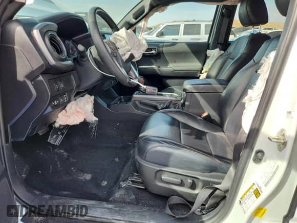 2020 Toyota Tacoma SR5 с VIN 5TFCZ5AN2LX236218, выставлен на аукционе Copart как лот 71645715 с пробегом 69 727 миль миль и Списание • Salvage title. История ставок и продаж доступна на DreamBid. Изображение 7.