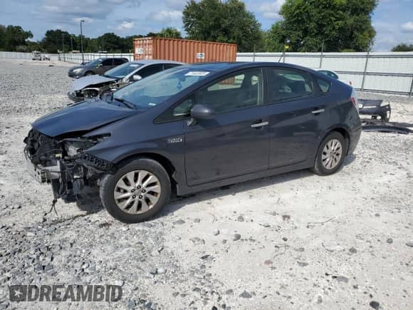 2012 Toyota Prius with VIN JTDKN3DP6C3006021, listed as a Copart auction lot 71443005 with 300,282 mi miles and Salvage title. Bid and sale history available at DreamBid. Image 1.