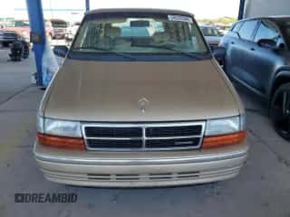 1991 Dodge Caravan with VIN 1B4GD54R1MX553940, listed as a Copart auction lot 59332594 with 110,858 mi miles and Salvage title. Bid and sale history available at DreamBid. Image 5.