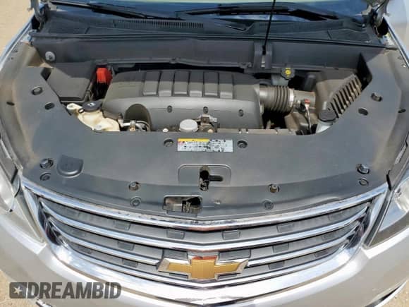 2015 Chevrolet Traverse LTZ с VIN 1GNKVJKD0FJ328089, выставлен на аукционе Copart как лот 69699025 с пробегом 165 233 миль миль и Списание • Salvage title. История ставок и продаж доступна на DreamBid. Изображение 12.