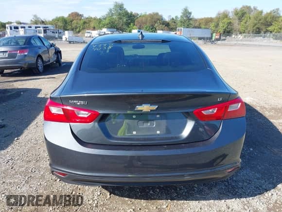 2018 Chevrolet Malibu LT z VIN 1G1ZD5ST8JF166998, wystawiony jako IAAI lot #43354038 z przebiegiem 100 794 mil mil oraz . Historia ofert i sprzedaży dostępna na DreamBid. Obrazek 15.