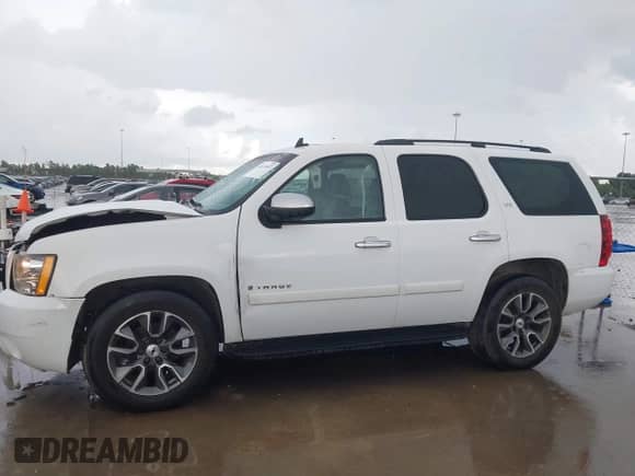 2008 Chevrolet Tahoe 1LT z VIN 1GNFC13078R218003, wystawiony jako IAAI lot #42613657 z przebiegiem 209 407 mil mil oraz . Historia ofert i sprzedaży dostępna na DreamBid. Obrazek 14.