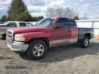 1999 Dodge RAM with VIN 3B7KC2266XG132392, listed as a Copart auction lot 50414255 with 291,862 mi miles and Salvage title. Bid and sale history available at DreamBid. Image 1.