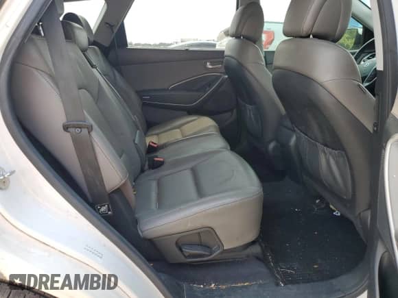 2018 Hyundai Santa Fe SE с VIN KM8SN4HF9JU263975, выставлен на аукционе Copart как лот 71532845 с пробегом 103 400 миль миль и Списание • Salvage title. История ставок и продаж доступна на DreamBid. Изображение 11.