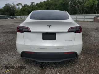 2022 Tesla Model Y Long Range with VIN 7SAYGDEE8NA012335, listed as a Copart auction lot 61217094 with 55,915 mi miles and Non repairable. Bid and sale history available at DreamBid. Image 6.