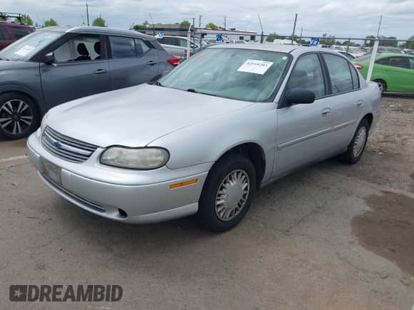 2005 Chevrolet Malibu Classic z VIN 1G1ND52F15M229451, wystawiony jako IAAI lot #42110203 z przebiegiem 153 682 mil mil oraz . Historia ofert i sprzedaży dostępna na DreamBid. Obrazek 2.