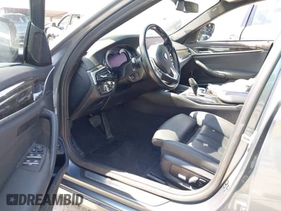 2019 BMW 5 Series 530i xDrive with VIN WBAJA7C51KWW12626, listed as a IAAI auction lot 42335449 with 71,798 mi miles and . Bid and sale history available at DreamBid. Image 5.