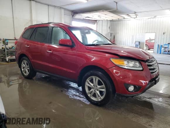2012 Hyundai Santa Fe Limited с VIN 5XYZK4AG2CG141140, выставлен на аукционе Copart как лот 65231845 с пробегом 134 989 миль миль и Списание • Salvage title. История ставок и продаж доступна на DreamBid. Изображение 4.