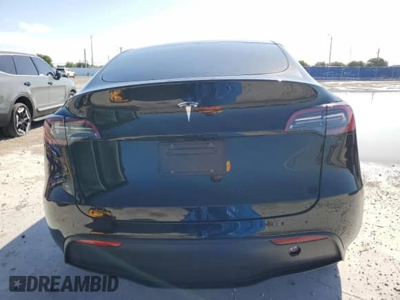 2024 Tesla Model Y с VIN 7SAYGDED9RF089599, выставлен на аукционе Copart как лот 84059915 с пробегом 32 641 миль миль и Списание • Salvage title. История ставок и продаж доступна на DreamBid. Изображение 6.