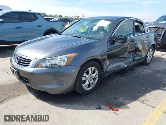 2010 Honda Accord LX-P with VIN 1HGCP2F40AA052935, listed as a IAAI auction lot 43324117 with 99,113 mi miles and . Bid and sale history available at DreamBid. Image 2.