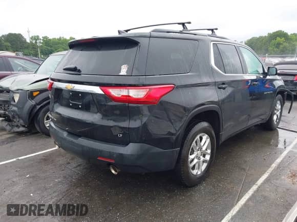 2019 Chevrolet Traverse LT Cloth z VIN 1GNEVGKW4KJ177866, wystawiony jako IAAI lot #42220370 z przebiegiem 101 731 mil mil oraz . Historia ofert i sprzedaży dostępna na DreamBid. Obrazek 4.