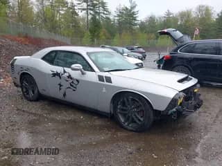 2019 Dodge Challenger SXT with VIN 2C3CDZGG9KH717332, listed as a IAAI auction lot 42240698 with 118,359 mi miles and . Bid and sale history available at DreamBid. Image 1.