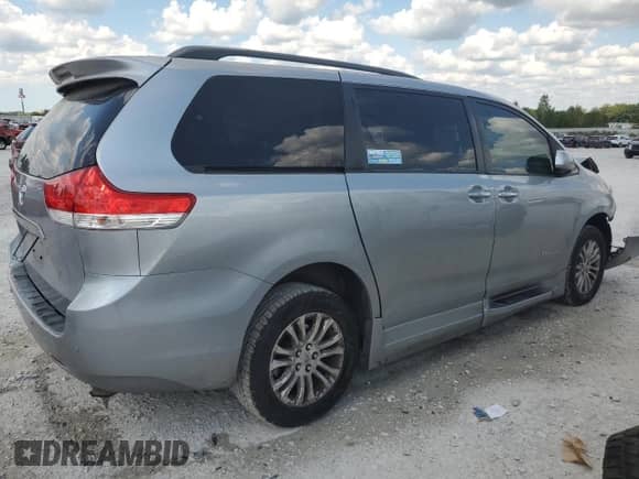 2012 Toyota Sienna XLE with VIN 5TDYK3DC6CS235796, listed as a Copart auction lot 70565525 with 120,990 mi miles and Clean title. Bid and sale history available at DreamBid. Image 3.