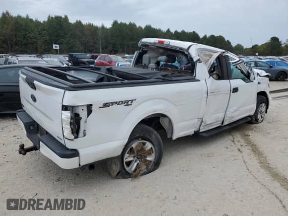 2018 Ford F-150 XL z VIN 1FTFX1EGXJFE40064, wystawiony jako Copart lot #71853335 z przebiegiem 65 539 mil mil oraz Szkoda całkowita • Salvage title. Historia ofert i sprzedaży dostępna na DreamBid. Obrazek 3.