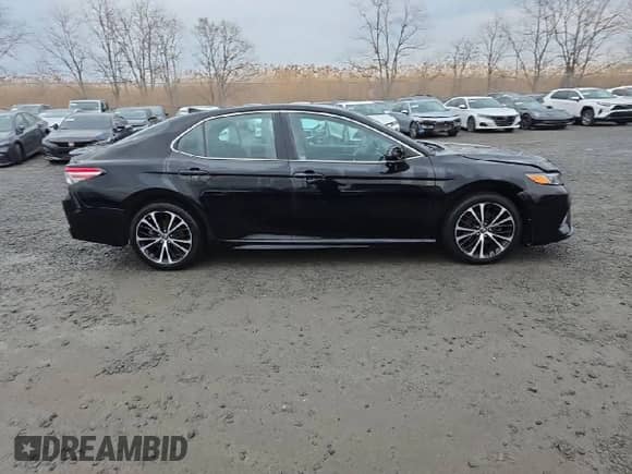 2019 Toyota Camry SE z VIN 4T1B11HK2KU178839, wystawiony jako Copart lot #90865985 z przebiegiem 54 949 mil mil oraz Szkoda całkowita • Salvage title. Historia ofert i sprzedaży dostępna na DreamBid. Obrazek 13.