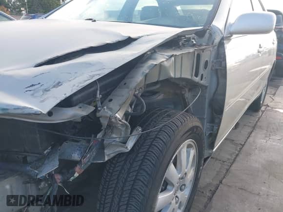 2003 Toyota Camry LE z VIN 4T1BF30K33U559514, wystawiony jako IAAI lot #43518376 z przebiegiem 203 514 mil mil oraz . Historia ofert i sprzedaży dostępna na DreamBid. Obrazek 14.