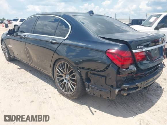 2013 BMW 7 Series 740Li xDrive with VIN WBAYF4C55DD127936, listed as a IAAI auction lot 42559835 with 82,976 mi miles and . Bid and sale history available at DreamBid. Image 3.