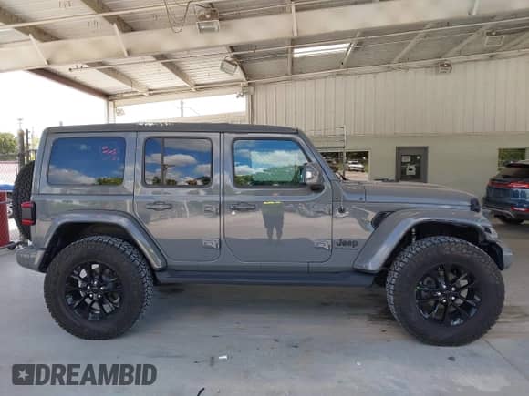 2023 Jeep Wrangler Sahara Altitude with VIN 1C4HJXEG0PW558839, listed as a IAAI auction lot 43001327 with 16,845 mi miles and . Bid and sale history available at DreamBid. Image 13.