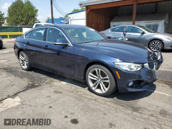 2016 BMW 4 Series 428i xDrive z VIN WBA4C9C50GG140732, wystawiony jako Copart lot #66198135 z przebiegiem 80 977 mil mil oraz Szkoda całkowita • Salvage title. Historia ofert i sprzedaży dostępna na DreamBid. Obrazek 4.
