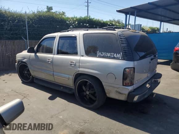 2004 Chevrolet Tahoe LS with VIN 1GNEC13T74R151824, listed as a Copart auction lot 70682005 with 204,620 mi miles and Salvage title. Bid and sale history available at DreamBid. Image 2.