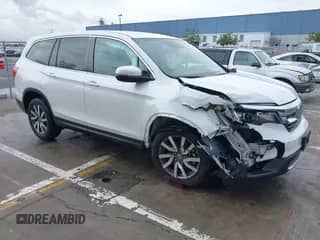 2020 Honda Pilot EX z VIN 5FNYF5H34LB019069, wystawiony jako IAAI lot #41538583 z przebiegiem 55 424 mil mil oraz . Historia ofert i sprzedaży dostępna na DreamBid. Obrazek 1.