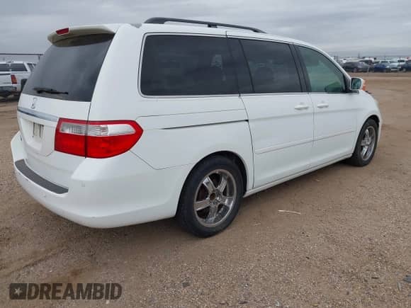 2006 Honda Odyssey Touring z VIN 5FNRL388X6B114012, wystawiony jako IAAI lot #43438223 z przebiegiem 260 977 mil mil oraz . Historia ofert i sprzedaży dostępna na DreamBid. Obrazek 4.