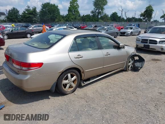 2003 Honda Accord EX with VIN JHMCM56683C013591, listed as a IAAI auction lot 42883936 with 199,776 mi miles and . Bid and sale history available at DreamBid. Image 4.