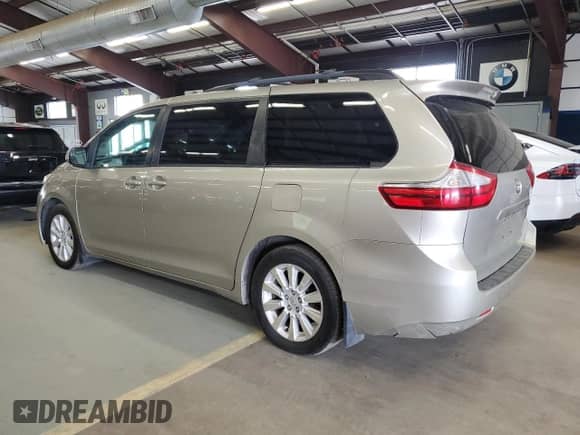 2016 Toyota Sienna LE with VIN 5TDJK3DC5GS132280, listed as a Copart auction lot 57935445 with 167,966 mi miles and Clean title. Bid and sale history available at DreamBid. Image 2.