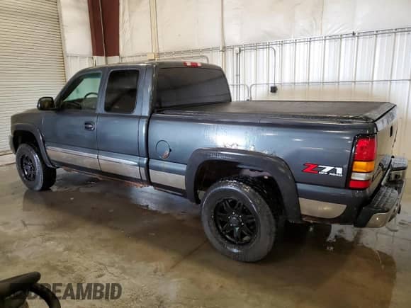 2004 GMC Sierra 1500 SLT z VIN 1GTEK19T84E196717, wystawiony jako Copart lot #71319585 z przebiegiem 241 913 mil mil oraz Czysty tytuł • Clean title. Historia ofert i sprzedaży dostępna na DreamBid. Obrazek 2.
