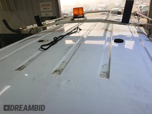 2011 Ford Econoline Cargo Commercial with VIN 1FTNE2EL2BDA70911, listed as a IAAI auction lot 43563678 with 148,036 mi miles and . Bid and sale history available at DreamBid. Image 17.