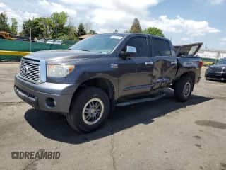 2013 Toyota Tundra Limited with VIN 5TFHW5F1XDX307218, listed as a Copart auction lot 61257415 with 137,684 mi miles and Salvage title. Bid and sale history available at DreamBid. Image 1.