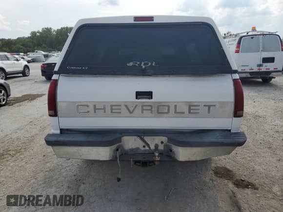 1997 Chevrolet Silverado 1500 with VIN 1GCEC14RXVZ124680, listed as a Copart auction lot 80872365 with 158,021 mi miles and Salvage title. Bid and sale history available at DreamBid. Image 6.