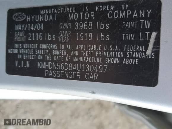 2004 Hyundai Elantra GT z VIN KMHDN56D84U130497, wystawiony jako Copart lot #49121055 z przebiegiem 96 046 mil mil oraz Szkoda całkowita • Salvage title. Historia ofert i sprzedaży dostępna na DreamBid. Obrazek 12.