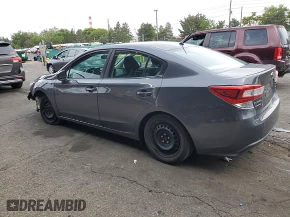 2018 Subaru Impreza with VIN 4S3GKAA65J1607654, listed as a Copart auction lot 58768765 with 62,275 mi miles and Salvage title. Bid and sale history available at DreamBid. Image 2.