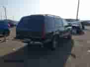 1995 Chevrolet Tahoe z VIN 1GNEC13K7SJ427888, wystawiony jako IAAI lot #42703275 z przebiegiem 251 895 mil mil oraz . Historia ofert i sprzedaży dostępna na DreamBid. Obrazek 4.