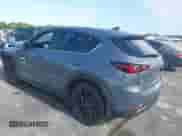 2024 Mazda CX-5 S Preferred z VIN JM3KFBCMXR0353299, wystawiony jako IAAI lot #42919399 z przebiegiem 56 673 mil mil oraz . Historia ofert i sprzedaży dostępna na DreamBid. Obrazek 3.