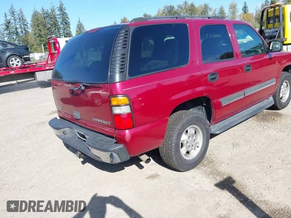 2004 Chevrolet Tahoe LS with VIN 1GNEK13Z04J228491, listed as a IAAI auction lot 43396306 with 322,410 mi miles and . Bid and sale history available at DreamBid. Image 4.