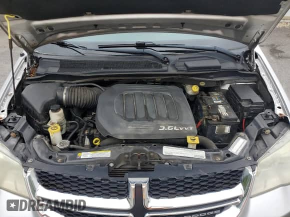 2011 Dodge Grand Caravan Crew with VIN 2D4RN5DG6BR660911, listed as a Copart auction lot 69046235 with 125,072 mi miles and Clean title. Bid and sale history available at DreamBid. Image 12.